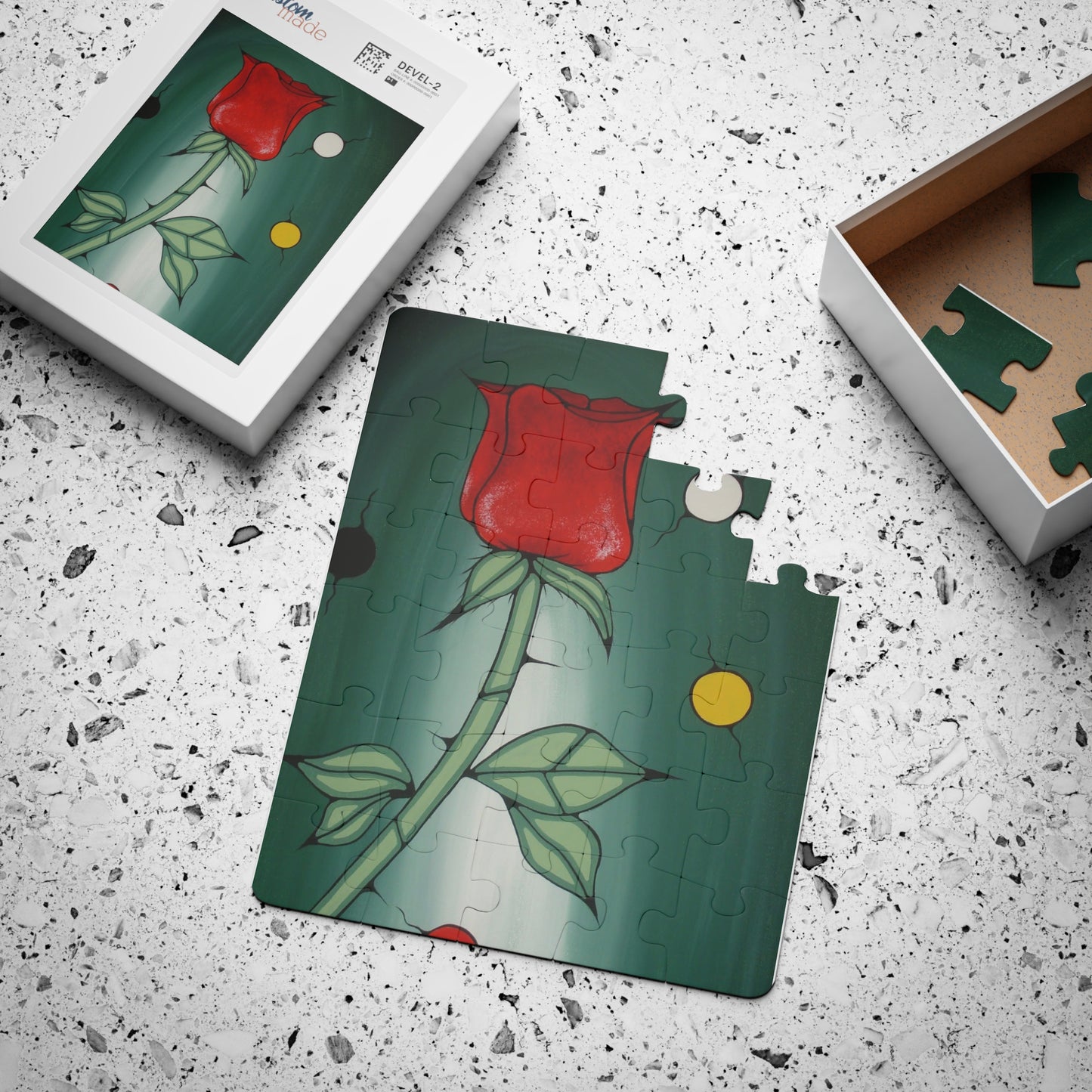Jigsaw puzzle with a rose design on a textured surface